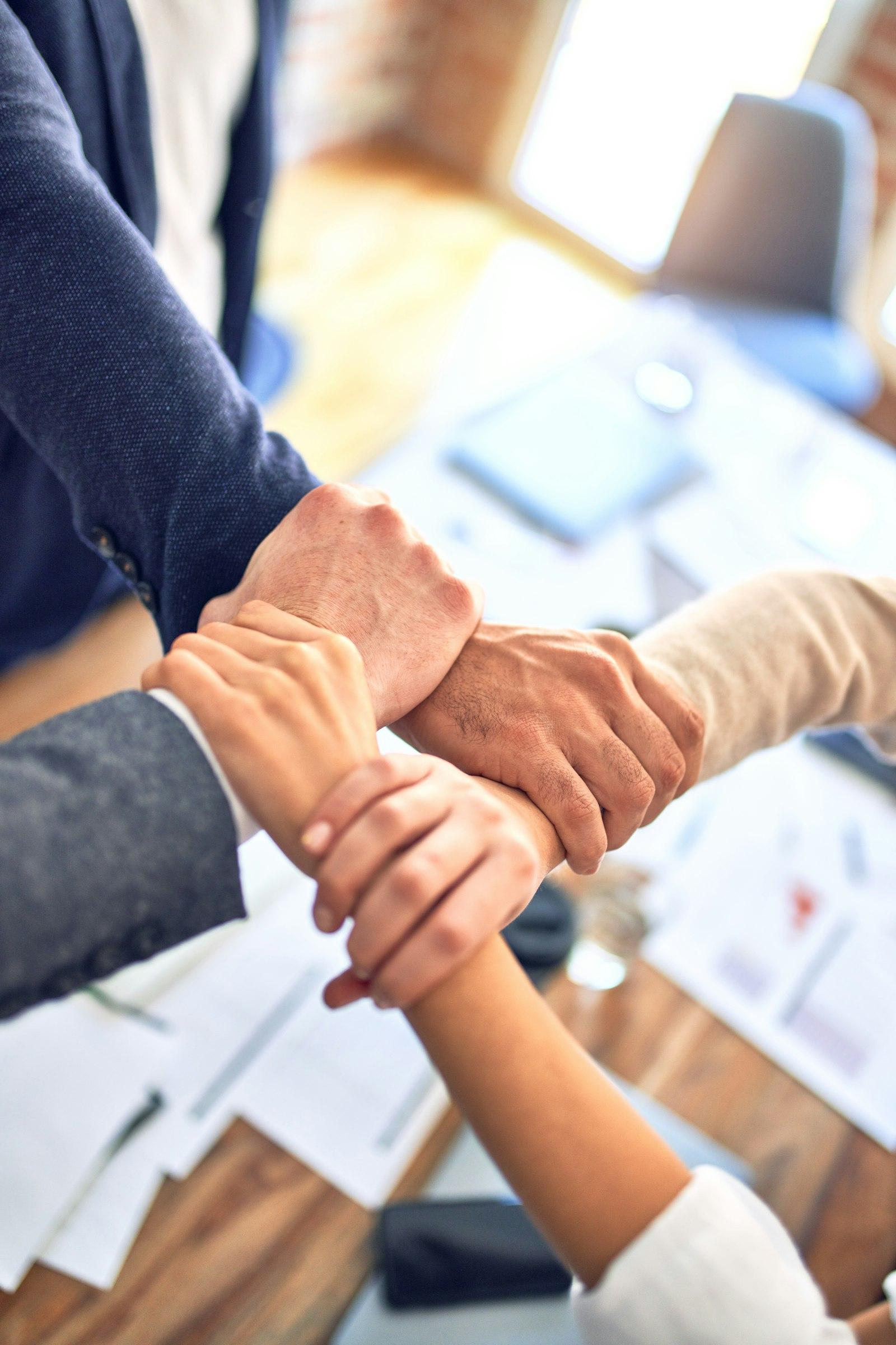 Engaged workplace team reflecting healthier happier workers